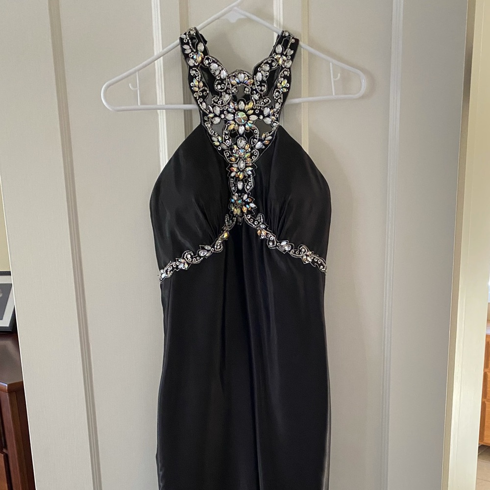 Special occasion dress. Worn twice. Very slimming.